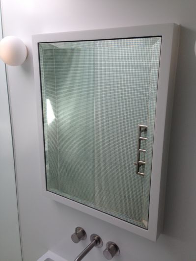 Corian Surround to Mirror Wall Cabinet