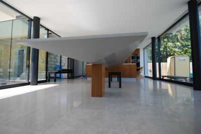 Chamfered underside support to Cantilever Table