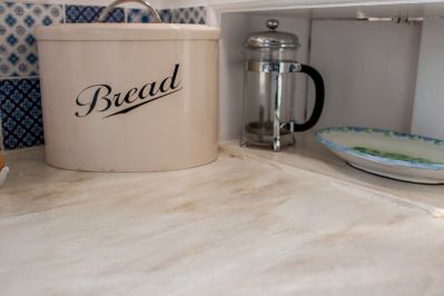 Close Up Detail of Corian Clamshell Worktop and Coved Upstand