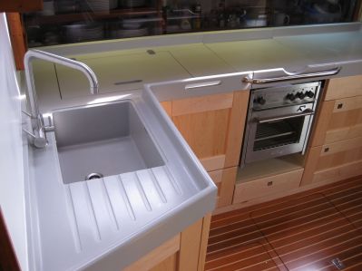 Yacht galley worktops with raised waterfall edge