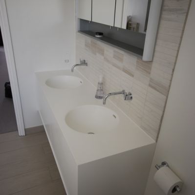 Double Basin Vanity Wrapped in Glacier White Corian