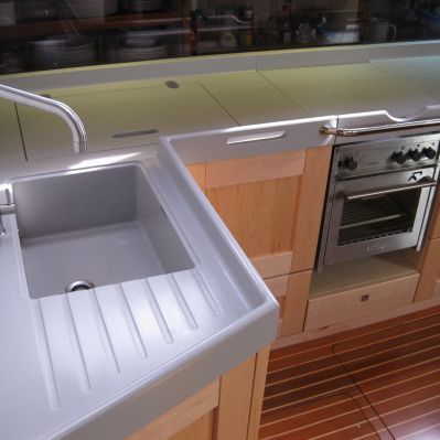 Yacht galley worktops with raised waterfall edge