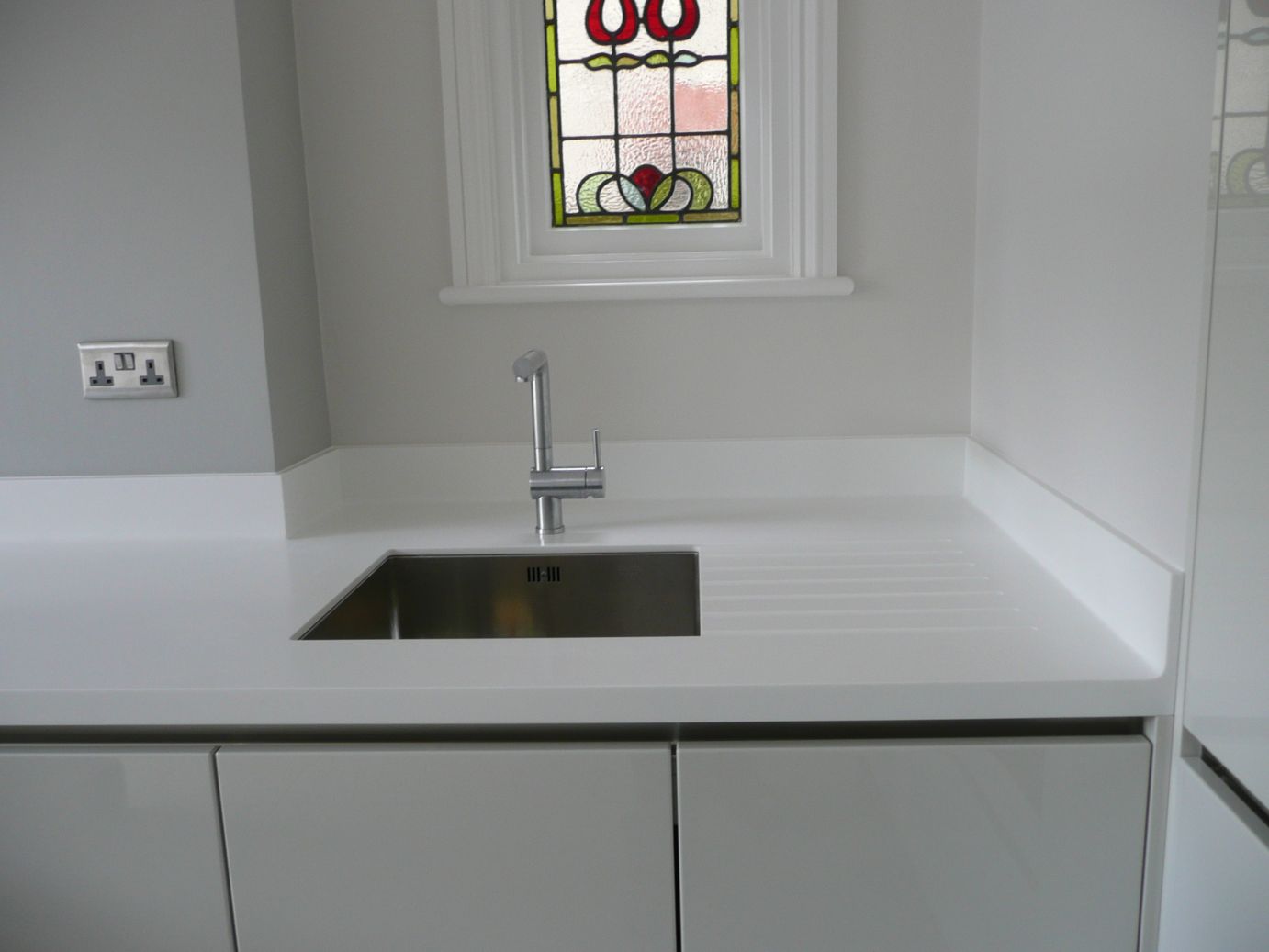 Coved Upstands On Corian Kitchen Worktop Solidity