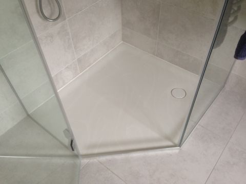 Bespoke Angled Shower Tray in Veined Corian