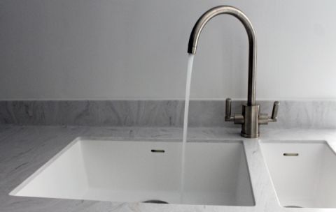 White 1.5 Bowl Sink in Corian Limestone Worktop