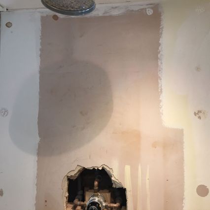 Only stuck to wall with a few blobs of silicone